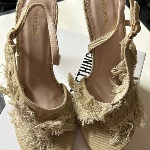Pretty little thing beige fringe Heels